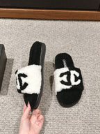 CHANEL SLIPPERS IN BLACK MIX WHITE FLEECE
