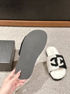 CHANEL SLIPPERS IN WHITE MIX BLACK FLEECE