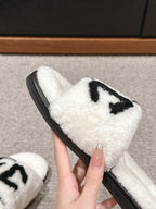 CHANEL SLIPPERS IN WHITE MIX BLACK FLEECE