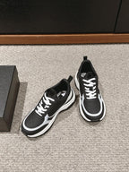 CHANEL CLASSIC SNEAKER IN BLACK MIX WHITE LAMBSKIN