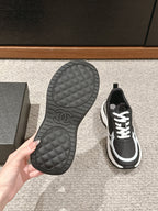 CHANEL CLASSIC SNEAKER IN BLACK MIX WHITE LAMBSKIN