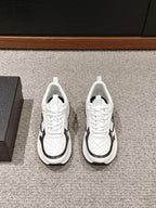 CHANEL CLASSIC SNEAKER IN WHITE MIX BLACK LAMBSKIN