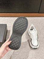 CHANEL CLASSIC SNEAKER IN WHITE MIX BLACK LAMBSKIN