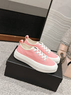 CHANEL LACE-UP SNEAKERS IN PASTEL PINK CANVAS