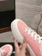 CHANEL LACE-UP SNEAKERS IN PASTEL PINK CANVAS