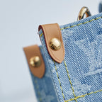 LOUIS VUITTON LET GO PM 28 IN LIGHT BLUE MONOGRAM DENIM GOLD HARDWARE