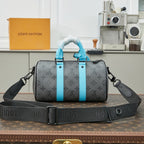LOUIS VUITTON KEEPALL BANDOULIÈRE 25 IN GUN METAL MONOGRAM ECLIPSE CANVAS MIX TURQUOISE CALFSKIN