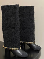 CHANEL FLORAL BOOTS 60MM IN BLACK CALFSKIN WITH GOLD CHAIN