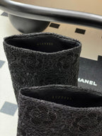 CHANEL FLORAL BOOTS 60MM IN BLACK CALFSKIN WITH GOLD CHAIN