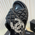 CHANEL Women's slippers with two crossed straps sheepskins black