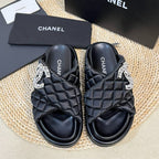 CHANEL Women's slippers with two crossed straps sheepskins black