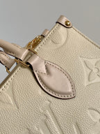 LOUIS VUITTON LV 25S ONTHEGO EAST WEST BAG 25 IN CREAM CALFSKIN MONOGRAM EMPREINTE