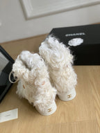 CHANEL ANKLE BOOTS IN WHITE MIX BLACK WOOL FUR