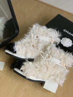 CHANEL ANKLE BOOTS IN WHITE MIX BLACK WOOL FUR