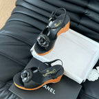 CHANEL Double C New Wood Grain Platform Sandal  Black Lambskin