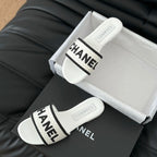 CHANEL Woven Embroidered Letter Slippers White Black