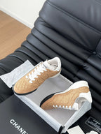CHANEL SNEAKER IN PEANUT BROWN MIX WHITE EMBROIDERED LAMBSKIN