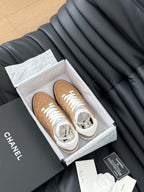 CHANEL SNEAKER IN PEANUT BROWN MIX WHITE EMBROIDERED LAMBSKIN