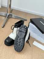 CHANEL CHUNKY BOOTS IN WHITE SMOOTH FLEECE AND BLACK CALFSKIN