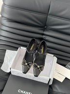 CHANEL POINTED TOE HIGH HEELS IN BLACK VELVET AND LAMBSKIN GOLD HARDWARE