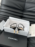 CHANEL PEARL SANDAL IN BLACK AND GOLD LAMBSKIN 75 MM