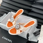 CHANEL VIVID ORANGE FABRIC  SLIDE SANDALS