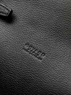 CHYPRE WALLET-POUCH 21 IN BLACK GOYARDINE CANVAS AND CALFSKIN