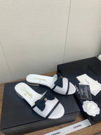 CHANEL BOW SLIPPERS IN WHITE LAMBSKIN