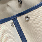 HERMES GARDEN PARTY 36 IN NAVY CREAM TOILE H CANVAS BLUE MARINE CALFSKIN ABSTRACT BEAR FACE PRINT