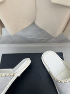 CHANEL White Suede Gold Chain Mules