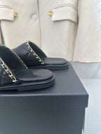 CHANEL Black Lambskin Gold Chain Mules
