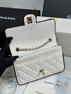 CHANEL QUILTED FLAP BAG WITH BLACK TRIM 19 IN WHITE LAMBSKIN