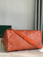 BOSTON 50 BAG IN ORANGE GOYARDINE CANVAS AND CALFSKIN TRIM