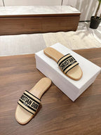 DIOR DWAY SLIDES IN BEIGE AND BLACK TECHNICAL FABRIC