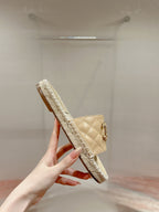 CHANEL FLAT SLIPPERS IN BEIGE CREAM LAMBSKIN AND WOVEN WITH LOGO