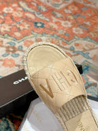 CHANEL FLAT SLIPPERS IN BEIGE LAMBSKIN MIX WOVEN