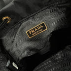 PRADA MINI BACKPACK 18 IN BLACK RE-NYLON AND GLOSSY CALFSKIN GOLD HARDWARE