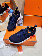 HERMES DEPART SLIP-ON SNEAKER IN NAVY BLUE KNIT AND CALFSKIN