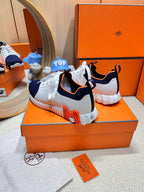 HERMES DEPART SLIP-ON SNEAKER IN NAVY BLUE KNIT AND WHITE CALFSKIN
