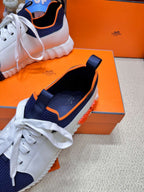 HERMES DEPART SLIP-ON SNEAKER IN NAVY BLUE KNIT AND WHITE CALFSKIN