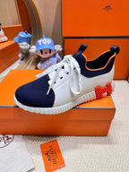 HERMES DEPART SLIP-ON SNEAKER IN NAVY BLUE KNIT AND WHITE CALFSKIN