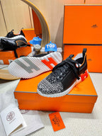 HERMES DEPART SLIP-ON SNEAKER IN WHITE MIX BLACK KNIT AND CALFSKIN