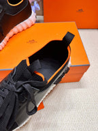 HERMES DEPART SLIP-ON SNEAKER IN BLACK MIX WHITE KNIT AND CALFSKIN