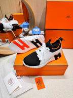 HERMES DEPART SLIP-ON SNEAKER IN WHITE MIX BLACK KNIT AND CALFSKIN