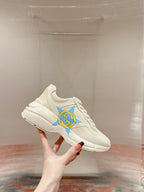 GUCCI RHYTON LOGO TRAINER WHITE CALFSKIN