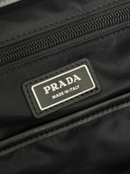 PRADA TRIANGLE LOGO BACKPACK 42 IN RHINO GRAY RE-NYLON