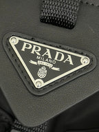 PRADA TRIANGLE LOGO BACKPACK 42 IN BLACK RE-NYLON