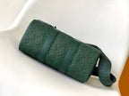 LOUIS VUITTON KEEPALL BANDOULIÈRE 25 IN FOREST GREEN MONOGRAM EMBOSSED CALFSKIN