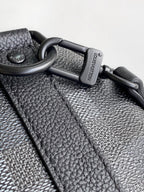 LOUIS VUITTON LV 25S KEEPALL BANDOULIÈRE 25 BAG IN DAMOFLAGE BLACK CALFSKIN