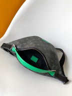 LOUIS VUITTON LV 25S DISCOVERY BUMBAG 44 IN BLACK NEON JADE MONOGRAM ECLIPSE CANVAS AND CALFSKIN